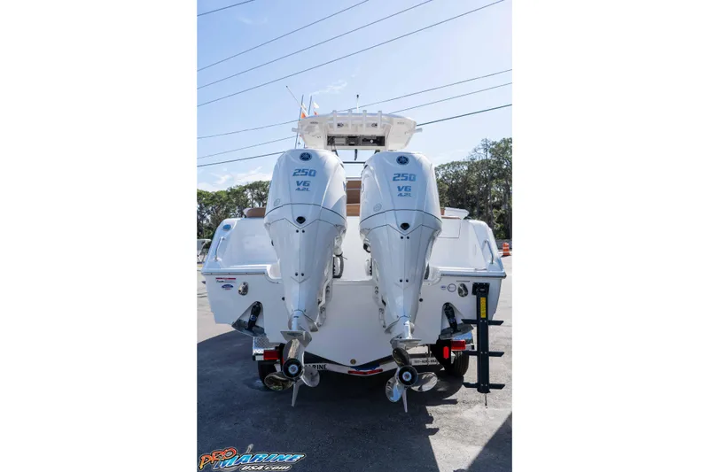 Slide: The Image of 2026 Sea Hunt Ultra 275 SE with dual 250 V6 outboard engines. - 12