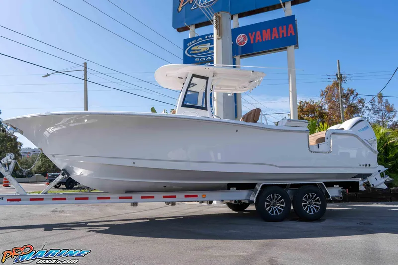 Slide: The Image of 2026 Sea Hunt Ultra 275 SE boat on trailer at dealership. - 6