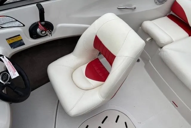 Slide: The Image of 2008 Tahoe Q5i SF boat interior with white and red seating. - 15