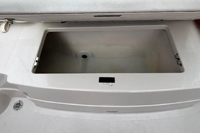Slide: The Image of Open storage compartment in a 2008 Tahoe Q5i SF boat. - 26