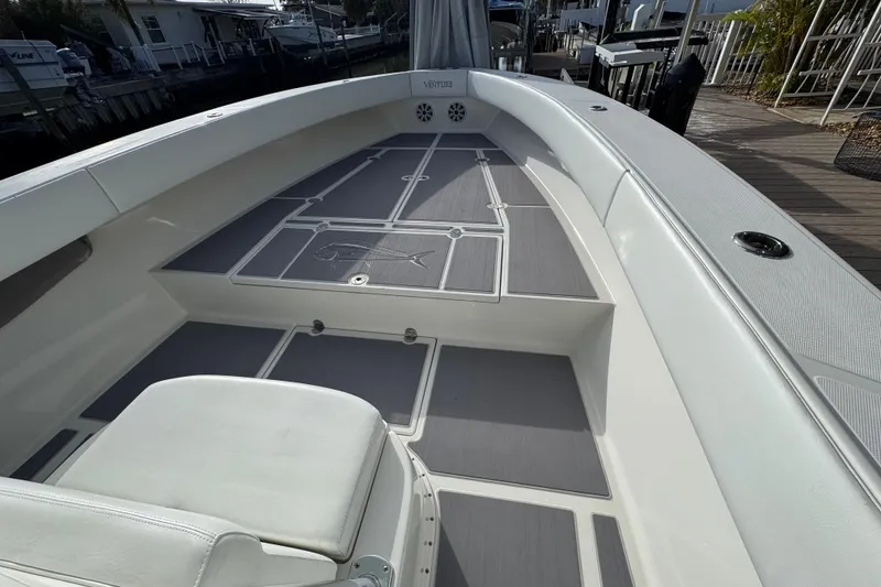Slide: The Image of 2009 Venture 39 Center Console boat with spacious deck and seating area. - 6