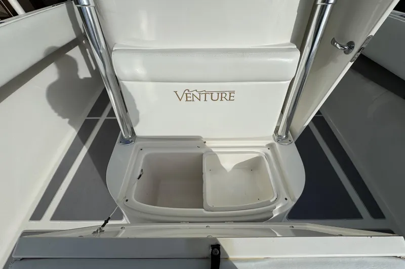 Slide: The Image of 2009 Venture 39 Center Console boat interior with storage compartment. - 9