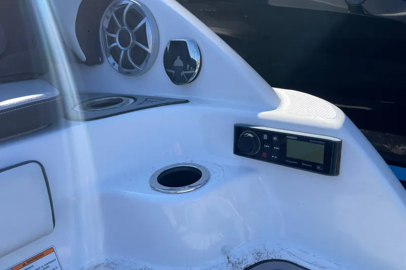 Slide: The Image of 2019 Yamaha Boats 242 Limited S E-Series dashboard with speaker and control panel. - 12