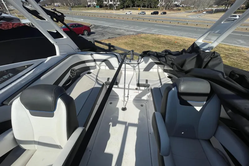 Slide: The Image of 2019 Yamaha Boats 242 Limited S E-Series interior with seating and open deck view. - 3