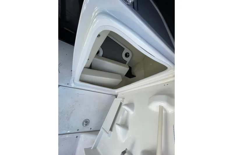 Slide: The Image of Open storage compartment in 2019 Yamaha Boats 242 Limited S E-Series. - 5