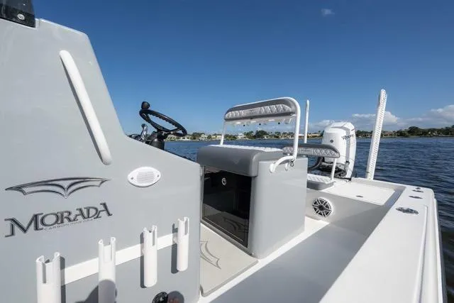 Slide: The Image of 2024 Islamorada Boatworks 24 on water, showcasing sleek design and modern features. - 22