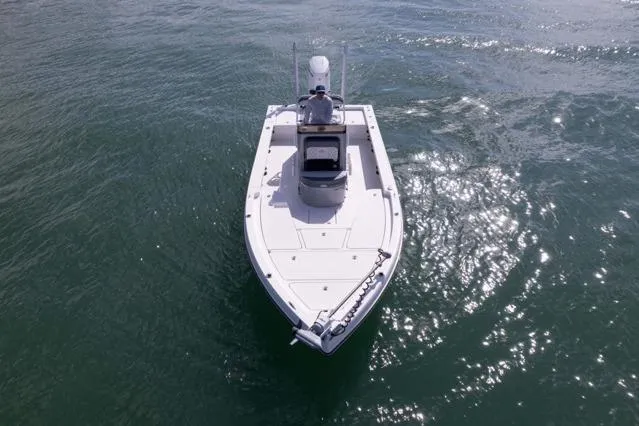 Slide: The Image of 2024 Islamorada Boatworks 24 on water, aerial view, sleek design, sunny day. - 55