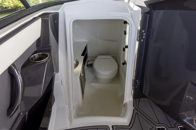 Slide: The Image of 2022 Monterey 275SS Super Sport boat interior bathroom with modern design and amenities. - 26