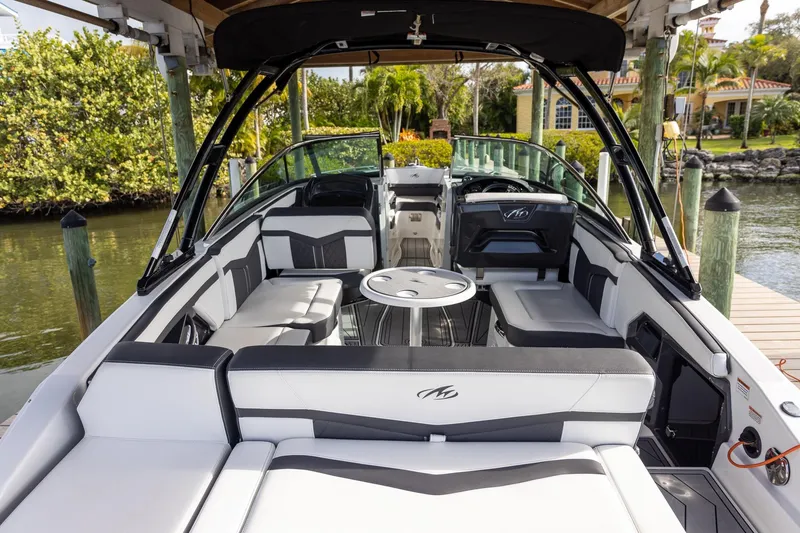 Slide: The Image of 2022 Monterey 275SS Super Sport boat interior with sleek seating and modern design. - 33