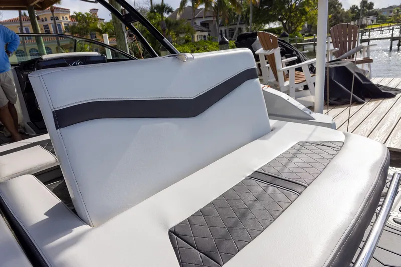 Slide: The Image of 2022 Monterey 275SS Super Sport boat seat with stylish black and white upholstery. - 38
