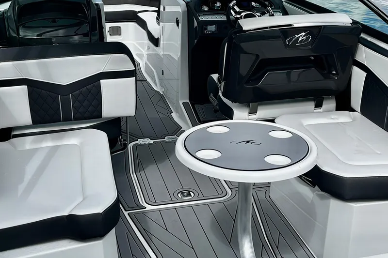 Slide: The Image of 2022 Monterey 275SS Super Sport boat cruising on open water under a cloudy sky. - 8