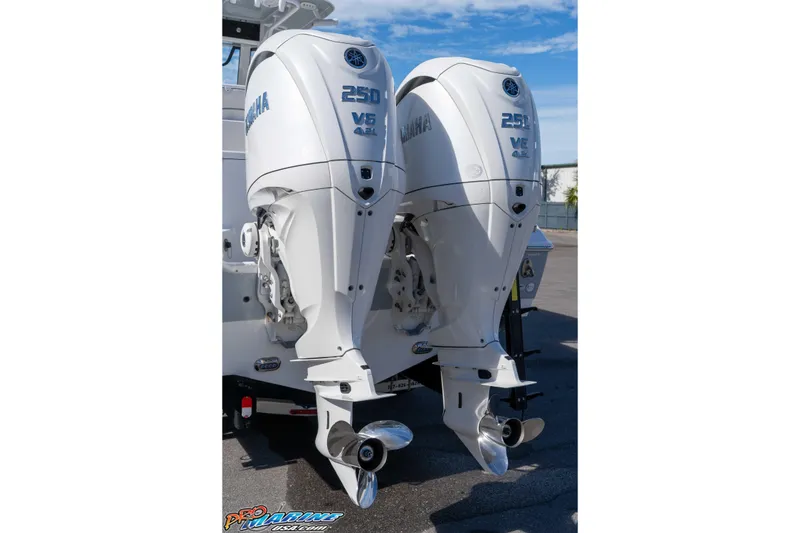 Slide: The Image of 2024 Sea Hunt Gamefish 27 with dual Yamaha 250 V6 outboard engines. - 19