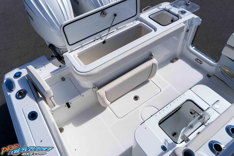 Slide: The Image of 2024 Sea Hunt Gamefish 27 boat interior with storage compartments and seating. - 39