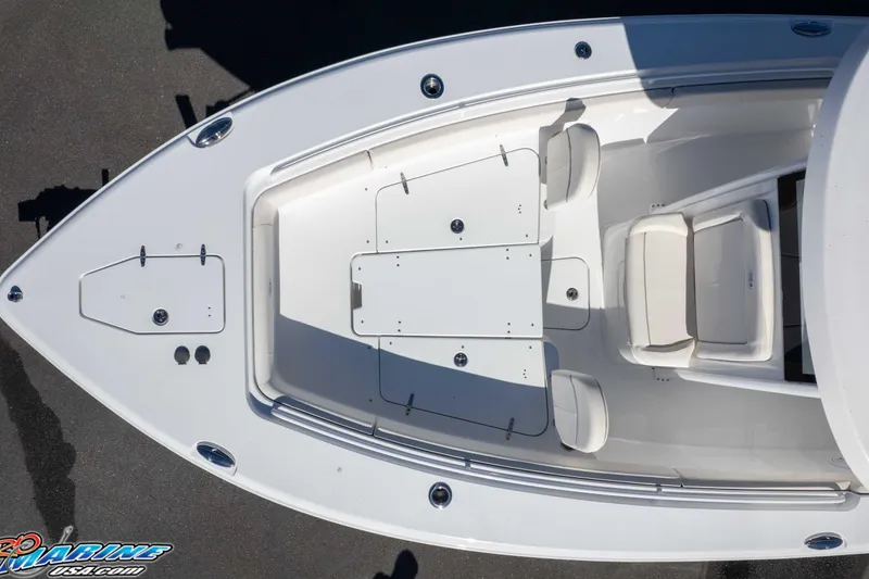 Slide: The Image of 2024 Sea Hunt Gamefish 27 boat, aerial view of bow seating and deck layout. - 48