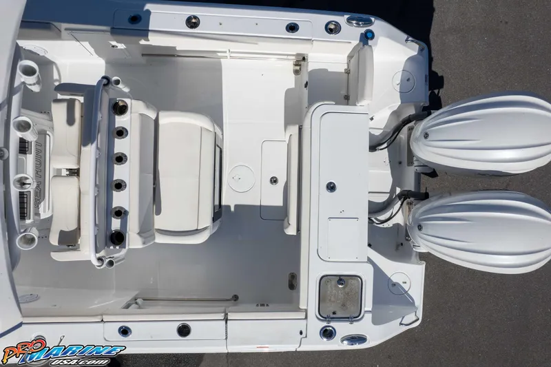 Slide: The Image of Top view of 2024 Sea Hunt Gamefish 27 boat with dual engines and seating area. - 50