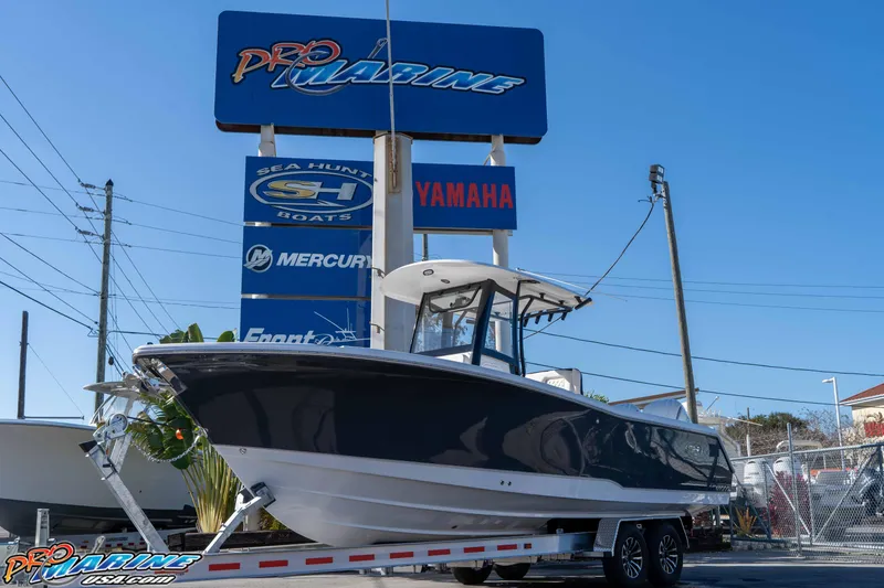 The Image of 2026 Sea Hunt Gamefish 27 Coffin Box boat on trailer at Pro Marine dealership. - 1