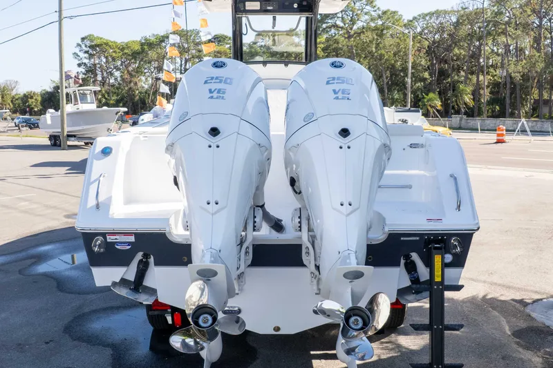 Slide: The Image of 2026 Sea Hunt Gamefish 27 Coffin Box with twin 250 V6 engines, rear view. - 20