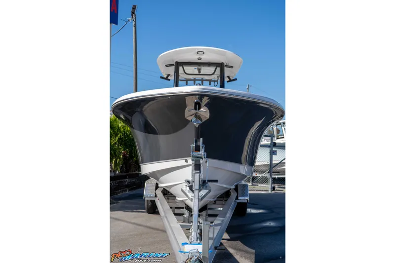 Slide: The Image of 2026 Sea Hunt Gamefish 27 Coffin Box boat on trailer, front view. - 23