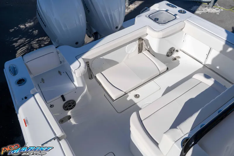 Slide: The Image of 2026 Sea Hunt Gamefish 27 Coffin Box boat interior with seating and storage. - 37