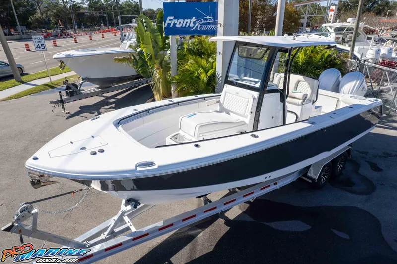 Slide: The Image of 2026 Sea Hunt Gamefish 27 Coffin Box boat on trailer at dealership. - 4