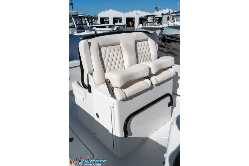 Slide: The Image of 2026 Sea Hunt Gamefish 27 Coffin Box boat seating with white cushioned seats. - 45