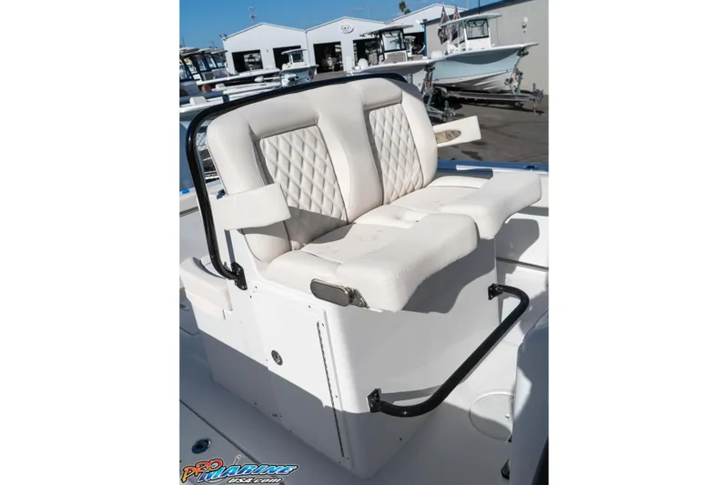 Slide: The Image of Luxury seating on 2026 Sea Hunt Gamefish 27 Coffin Box boat, featuring diamond-stitched upholstery. - 46