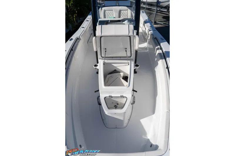 Slide: The Image of 2026 Sea Hunt Gamefish 27 Coffin Box boat interior with open storage compartments. - 50