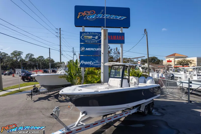 Slide: The Image of 2026 Sea Hunt Gamefish 27 Coffin Box boat displayed at Pro Marine dealership. - 52