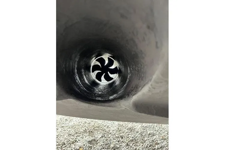 Slide: The Image of Close-up of a 2003 Sea Ray 410 Sundancer's bow thruster propeller. - 36