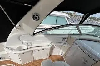 Slide: The Image of 2003 Sea Ray 410 Sundancer yacht interior with sleek design and modern amenities. - 4