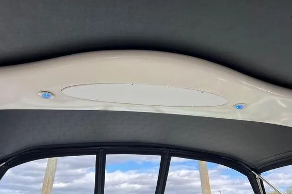 Slide: The Image of Ceiling view of 2003 Sea Ray 410 Sundancer boat with blue LED lights. - 8