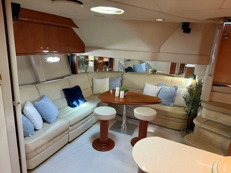 Slide: The Image of Luxurious interior of 2000 Sea Ray 510 Sundancer yacht with plush seating and elegant decor. - 15