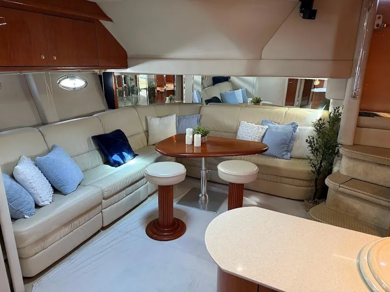Slide: The Image of Luxurious interior of 2000 Sea Ray 510 Sundancer yacht with plush seating and elegant decor. - 20
