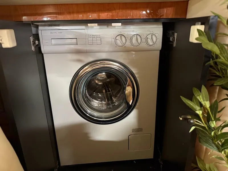 Slide: The Image of Washing machine inside a 2000 Sea Ray 510 Sundancer yacht cabinet. - 37