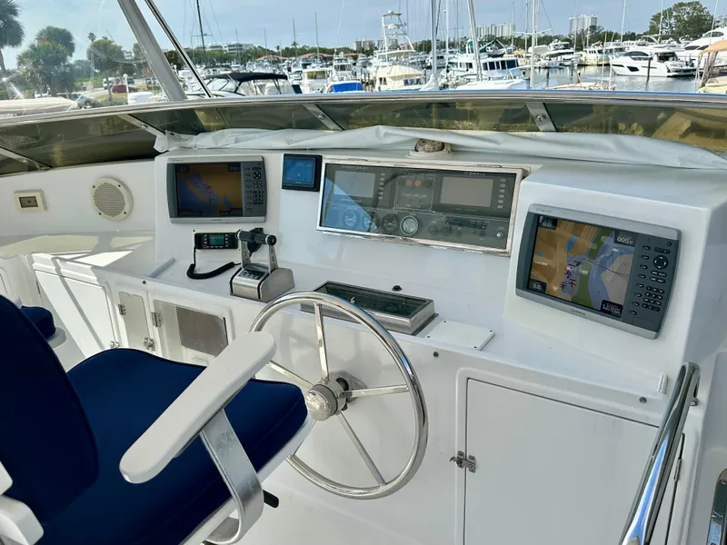 Slide: The Image of Helm of 2002 Jefferson Marquessa 57 MY yacht with navigation equipment and steering wheel. - 14
