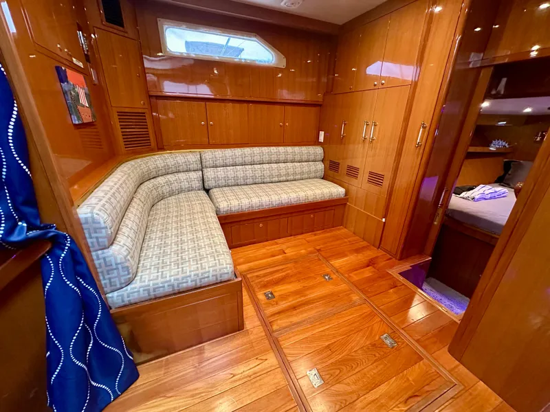 Slide: The Image of Luxurious interior of 2002 Jefferson Marquessa 57 MY yacht with wood flooring and plush seating. - 19