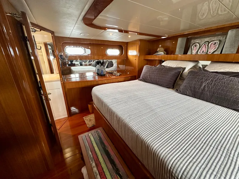 Slide: The Image of Luxurious bedroom interior of 2002 Jefferson Marquessa 57 MY yacht with wood paneling. - 22