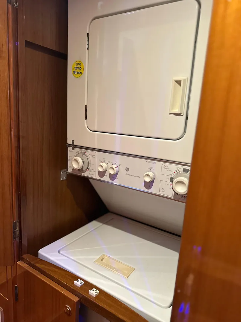 Slide: The Image of Stacked washer and dryer inside 2002 Jefferson Marquessa 57 MY yacht. - 25