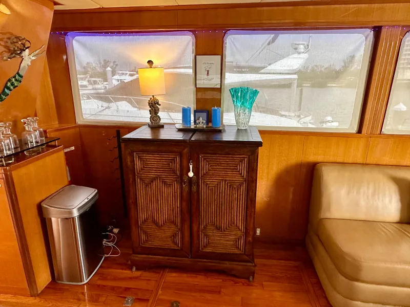 Slide: The Image of Luxurious interior of 2002 Jefferson Marquessa 57 MY yacht with elegant wooden cabinet and decor. - 27