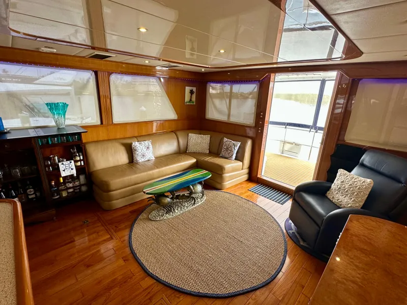 Slide: The Image of Luxurious interior of 2002 Jefferson Marquessa 57 MY yacht with leather seating and elegant decor. - 30