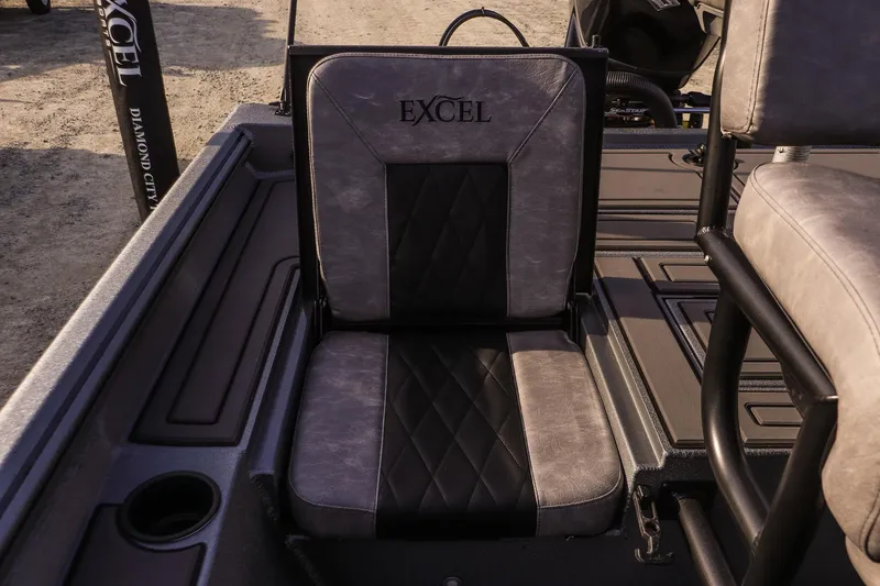 Slide: The Image of 2026 Excel 220 Bay Pro Elite boat seat with diamond stitching and cup holder. - 19