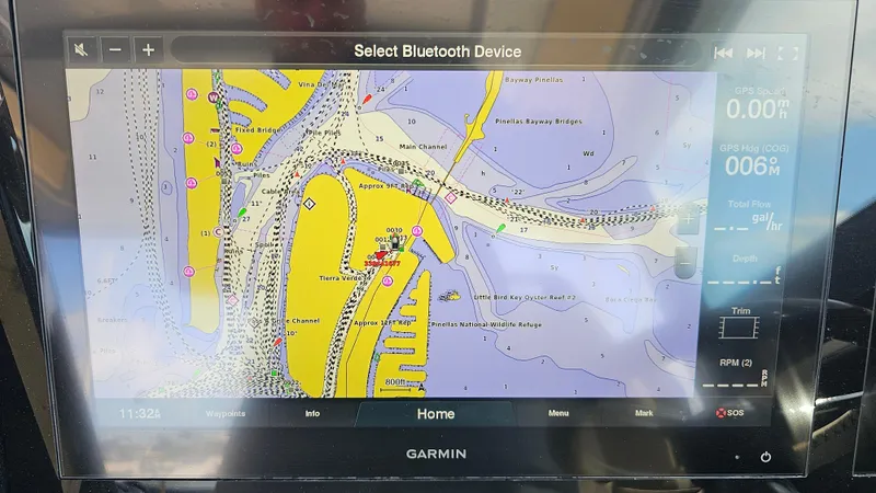 Slide: The Image of Garmin marine GPS display on 2022 Chris-Craft Calypso 35, showing nautical chart and navigation details. - 17