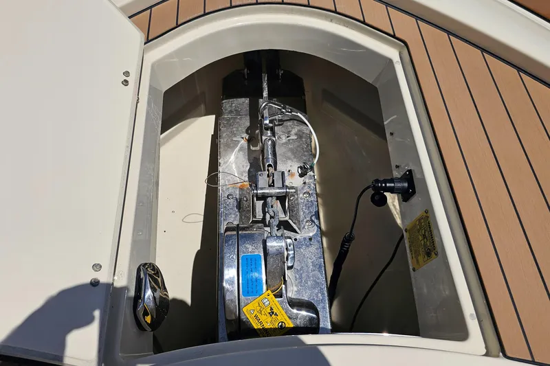 Slide: The Image of 2022 Chris-Craft Calypso 35 boat anchor compartment with teak decking. - 24
