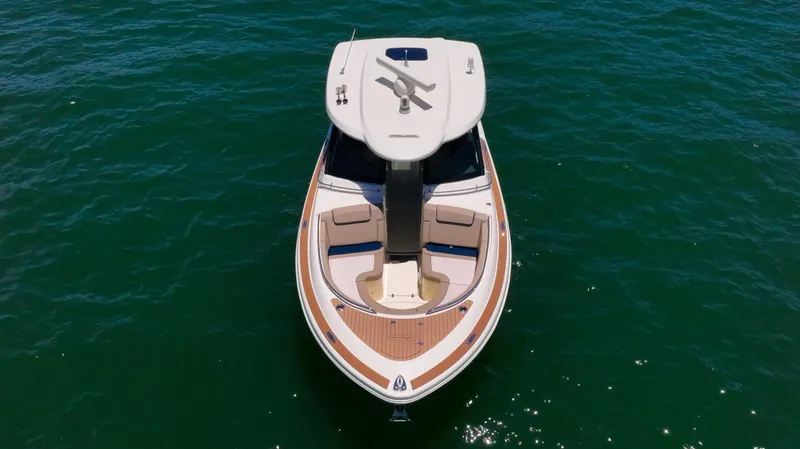 Slide: The Image of 2022 Chris-Craft Calypso 35 boat on water, aerial view. - 9