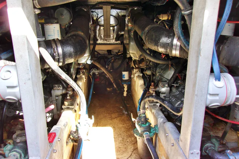 Slide: The Image of Engine room of a 1992 Sea Ray 400 Express Cruiser with visible components. - 32