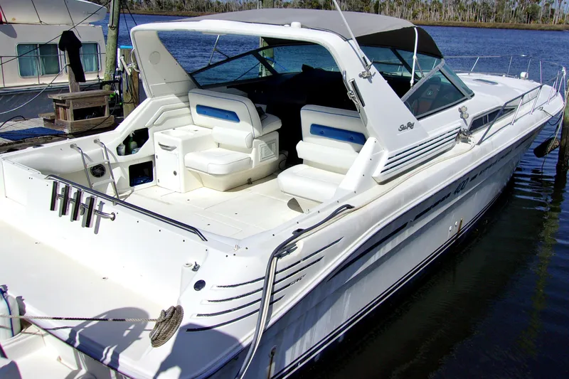Slide: The Image of 1992 Sea Ray 400 Express Cruiser docked, rear view. - 5