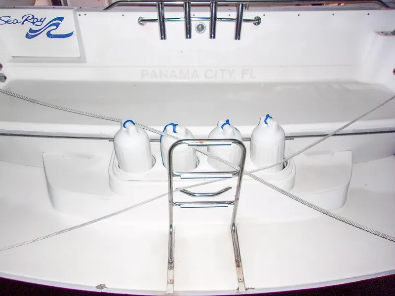 Slide: The Image of 1992 Sea Ray 400 Express Cruiser stern with ladder and fenders, Panama City, FL. - 7