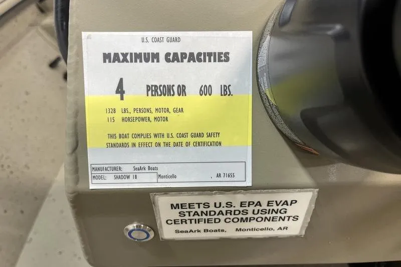 Slide: The Image of SeaArk Shadow 18T 2025 boat capacity label, U.S. Coast Guard certified, 4 persons or 600 lbs. - 11