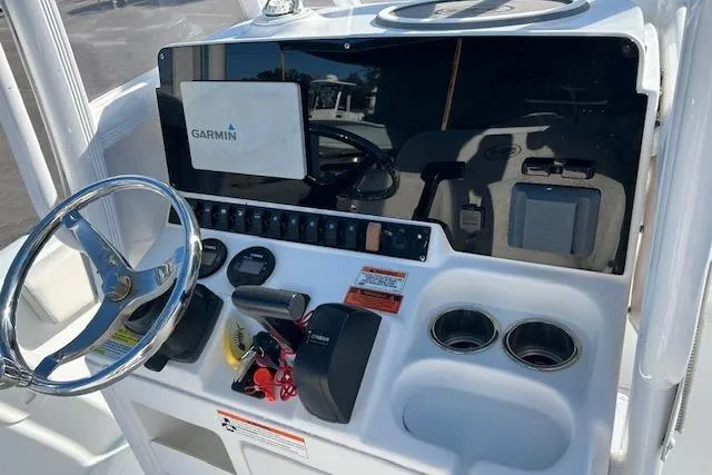 Slide: The Image of Control panel of a 2020 Sea Hunt Ultra 225 boat with Garmin navigation system. - 4