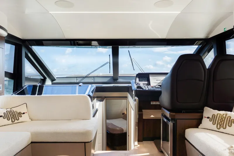 Slide: The Image of Luxurious interior of 2019 Absolute 58 FLY yacht with modern helm and seating. - 19